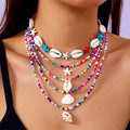 Five multi-layer shell bead necklaces with adjustable chains in blue and mixed colours