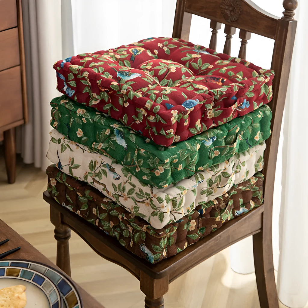 American style dining chair cushion in floral apricot pattern with bird motifs measuring 40x40x8cm