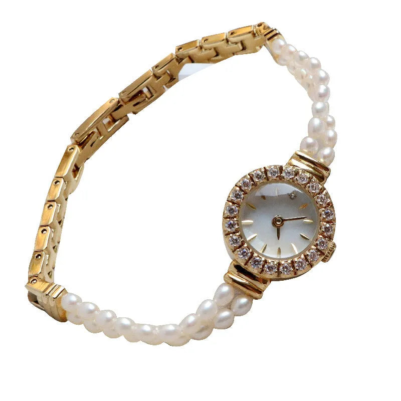 Women's light gold freshwater pearl bracelet watch with 18mm round dial and stainless steel construction