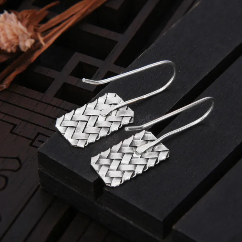 Silver geometric diamond earrings with woven plaid pattern, 17.5mm by 11mm