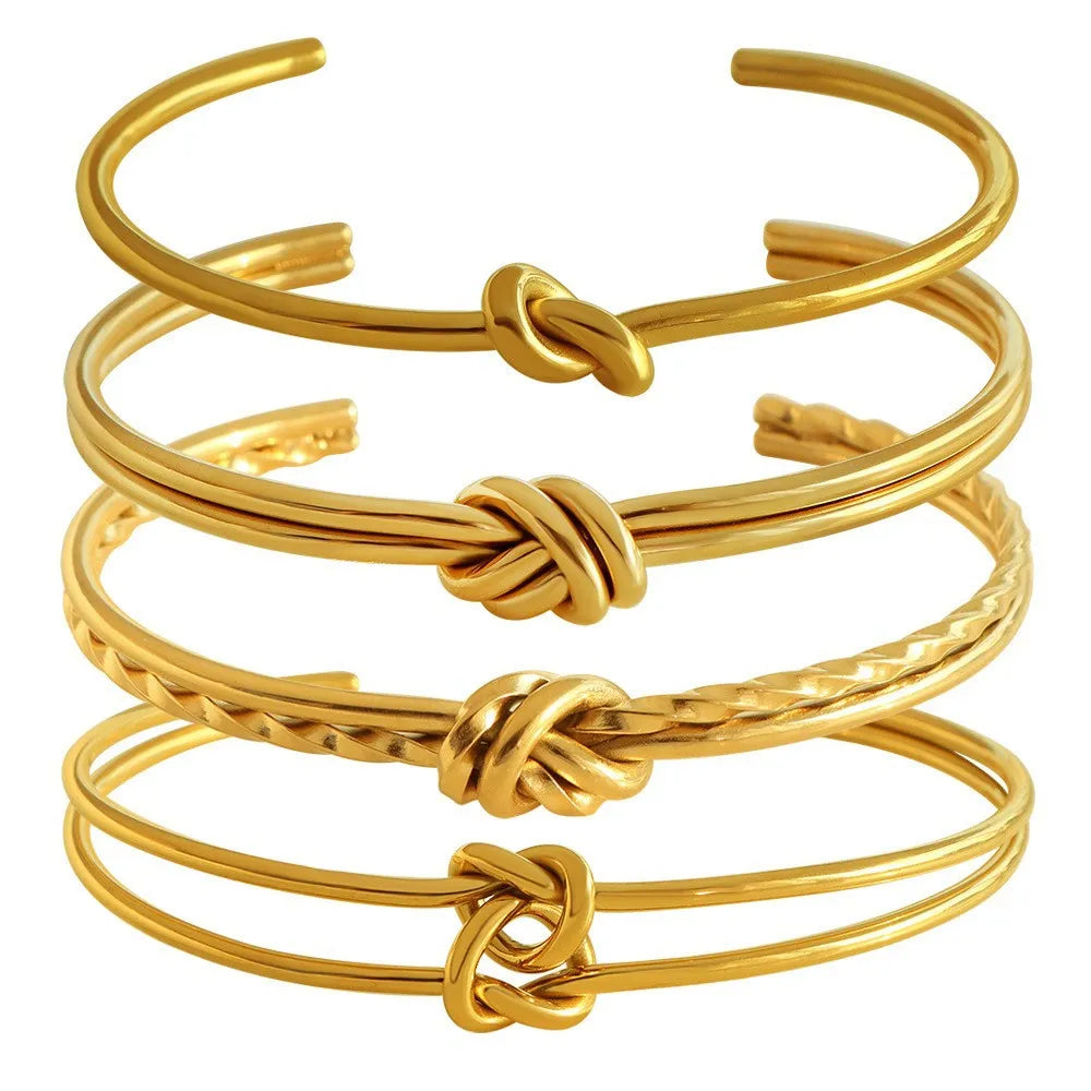 Adjustable C-shaped open double-layer women's bracelet with a knotted clasp in gold or silver finish.