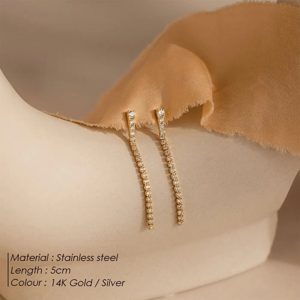 Geometric zircon earrings with stainless steel construction in gold and steel colour options