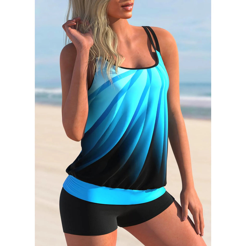 Plus size women's swimsuit set with butterfly print, featuring a strapped top and matching shorts.