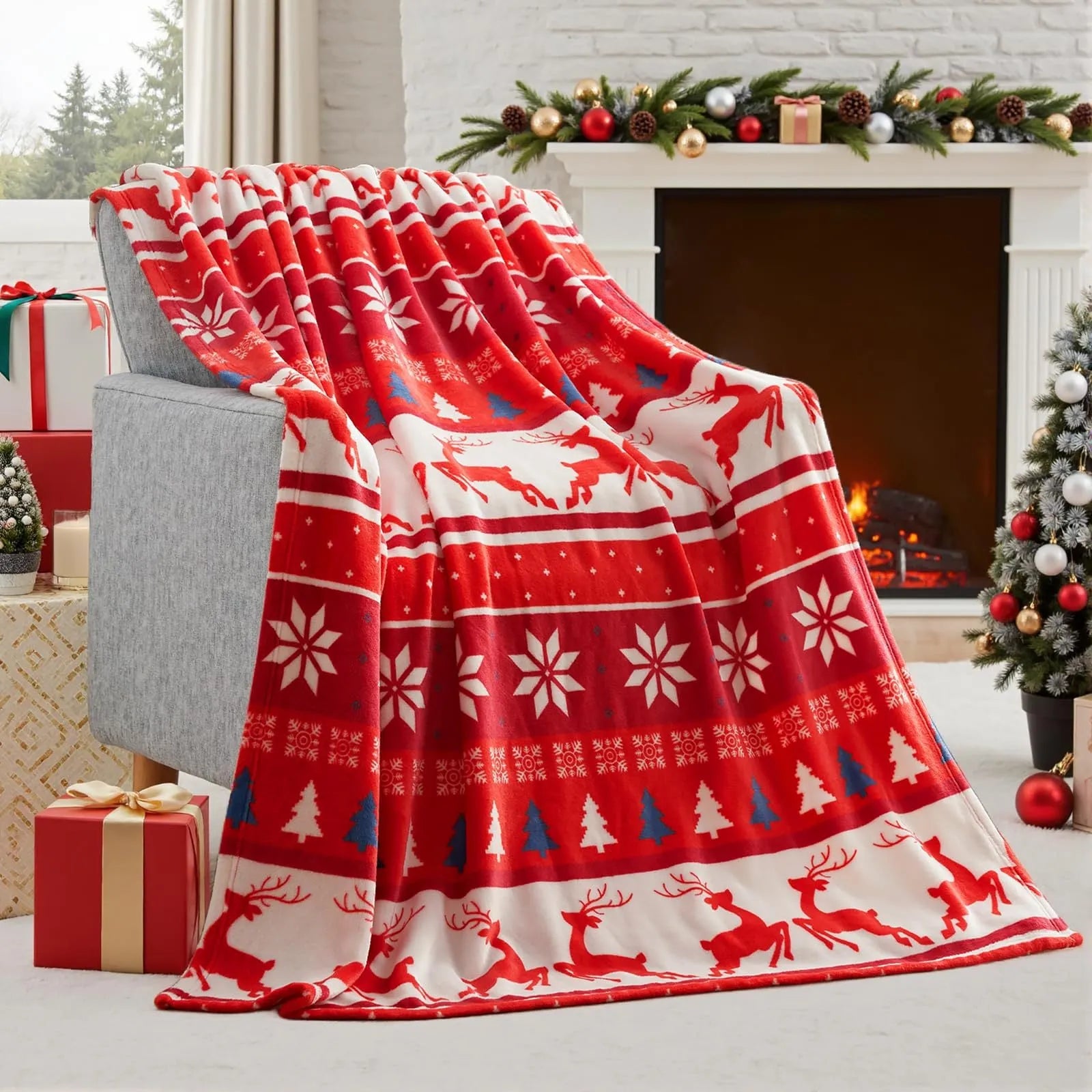 Soft red polyester flannel Christmas blanket with festive pattern draped over a bed