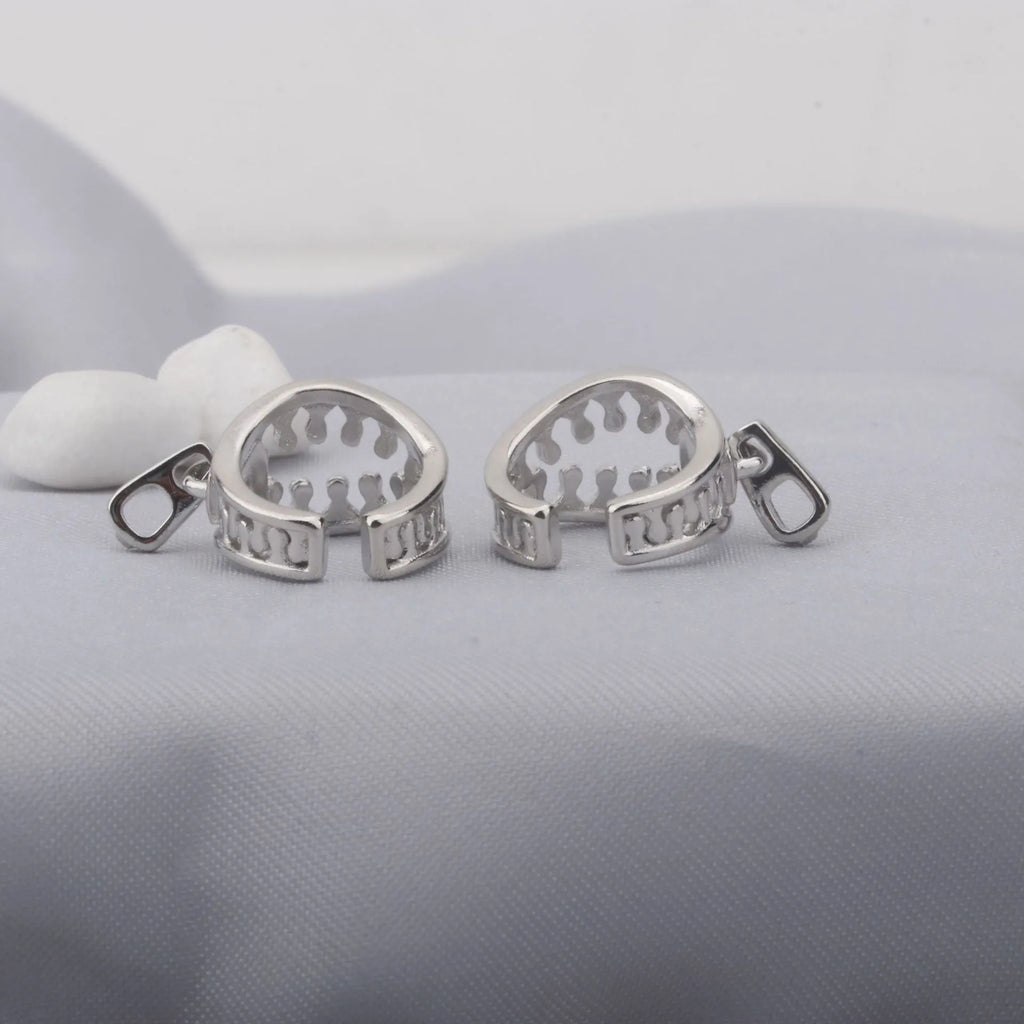 Copper geometric ear bone clip with linear patterns and zipper fastening in ES862 colour