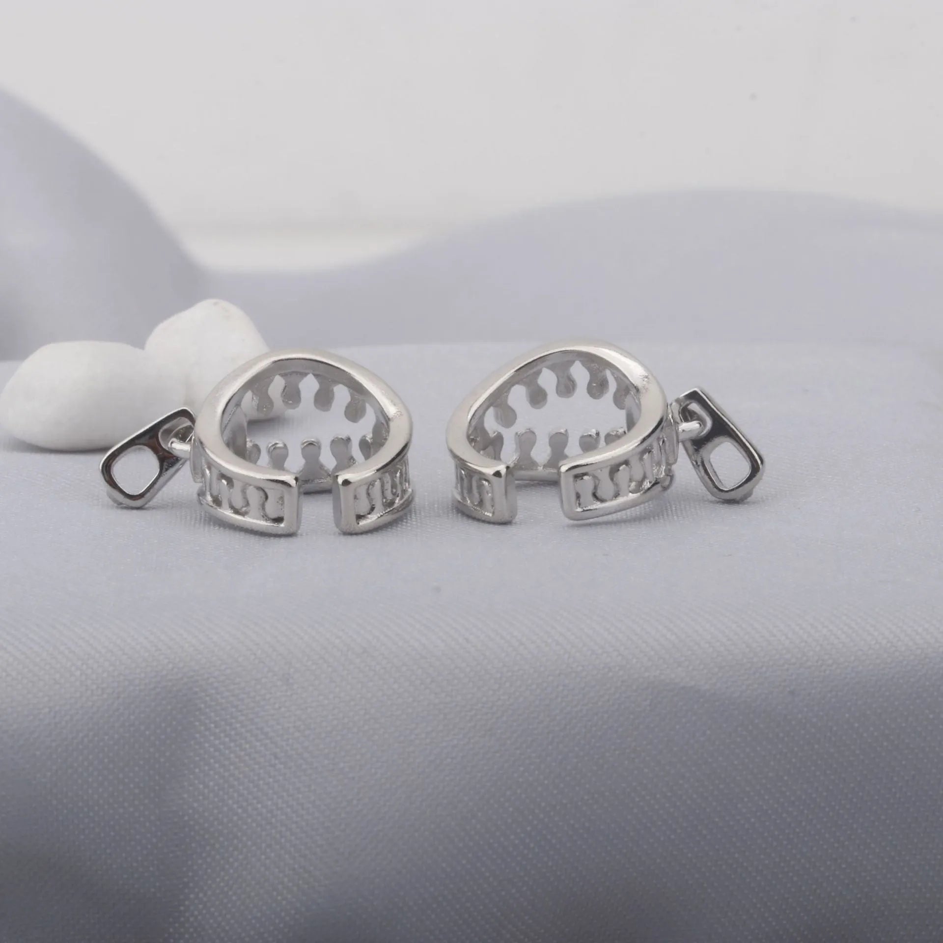Copper geometric ear bone clip with linear patterns and zipper fastening in ES862 colour