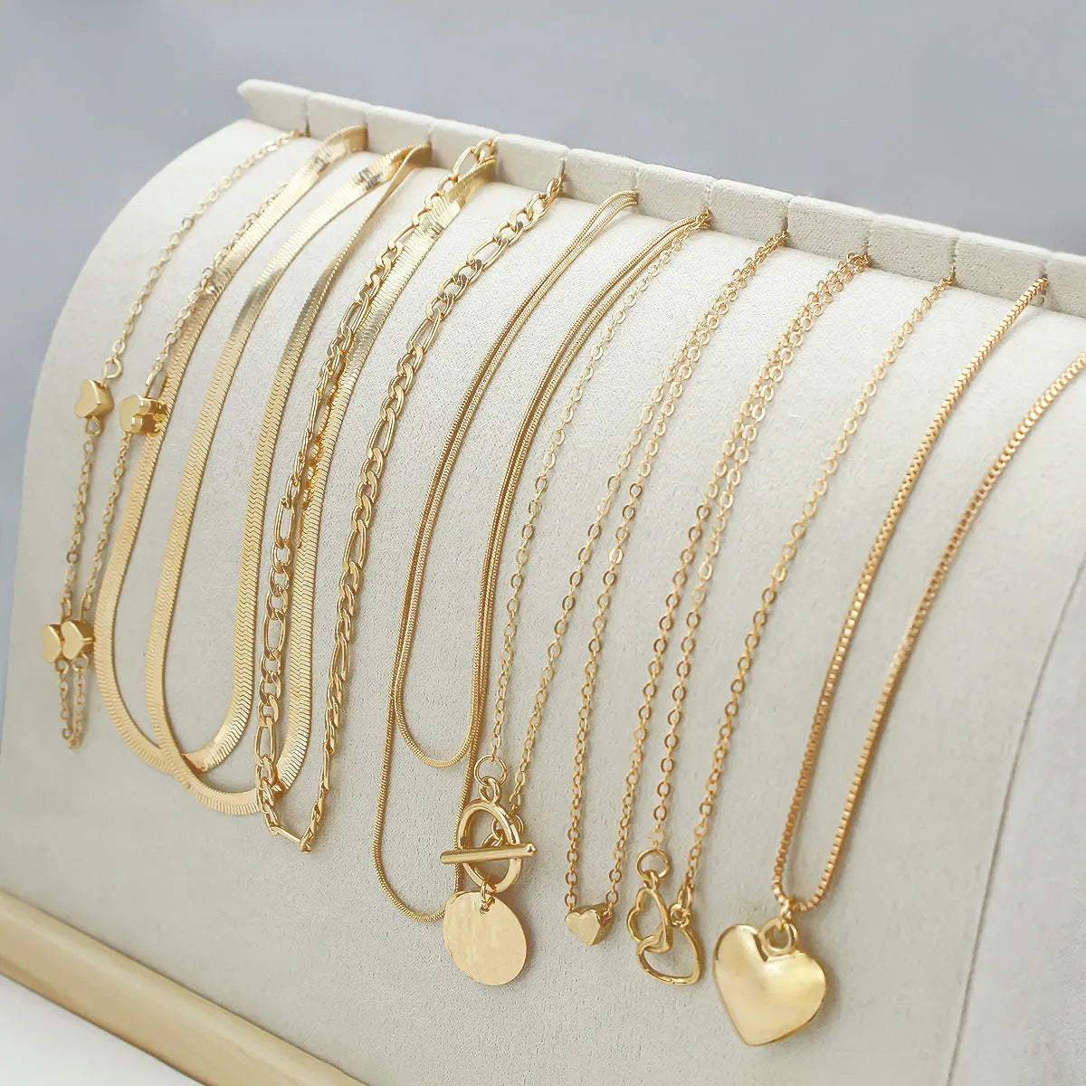 Gold electroplated women's necklace set with snake bones chain and adjustable length jewellery