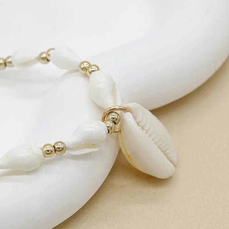 Cold Wind white conch shell necklace with mother-of-pearl pendant on regular chain