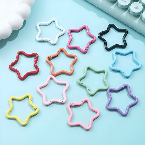 Zinc alloy five-pointed star keychain in light pink, one of ten available macaron colours.