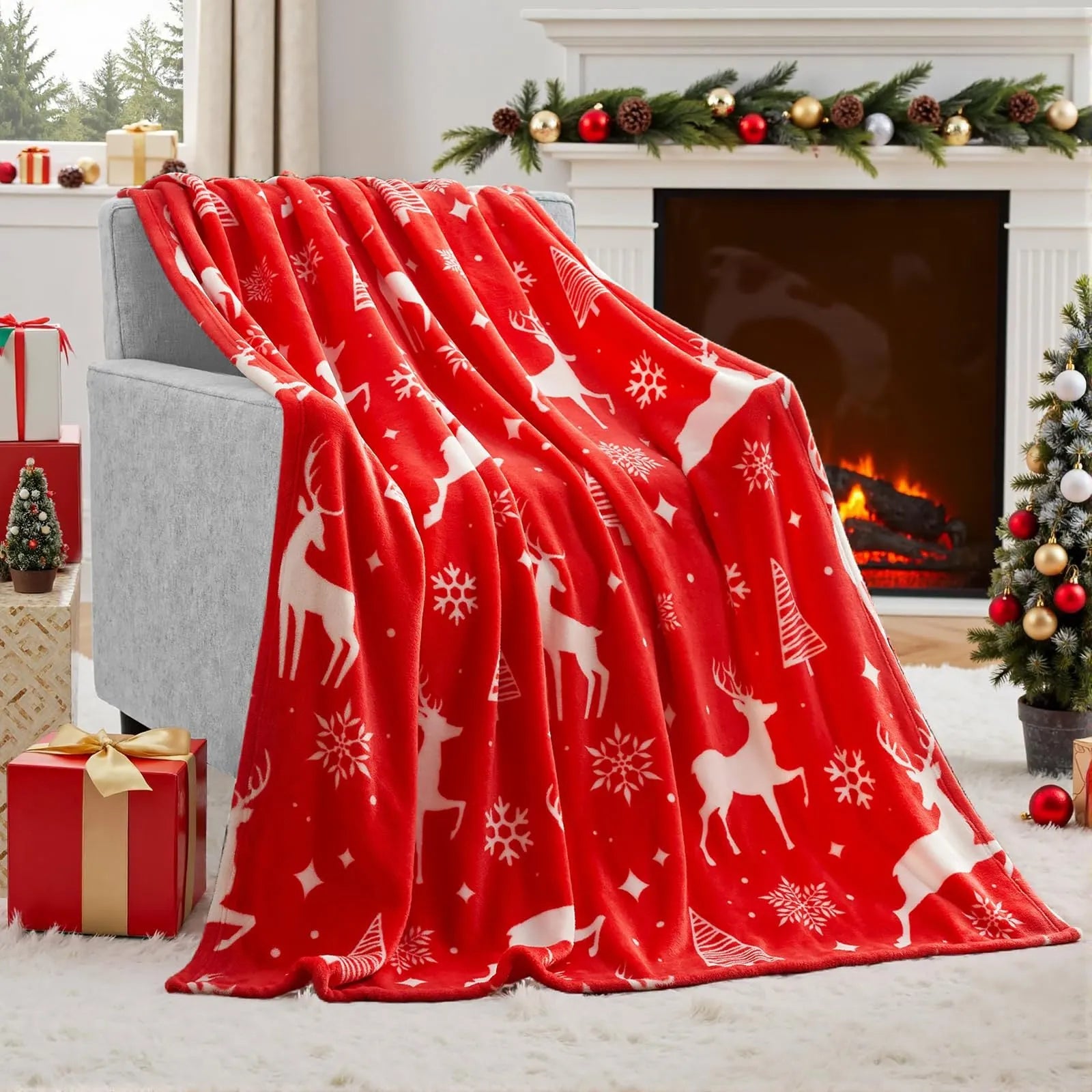 Soft red polyester flannel Christmas blanket with festive pattern draped over a bed