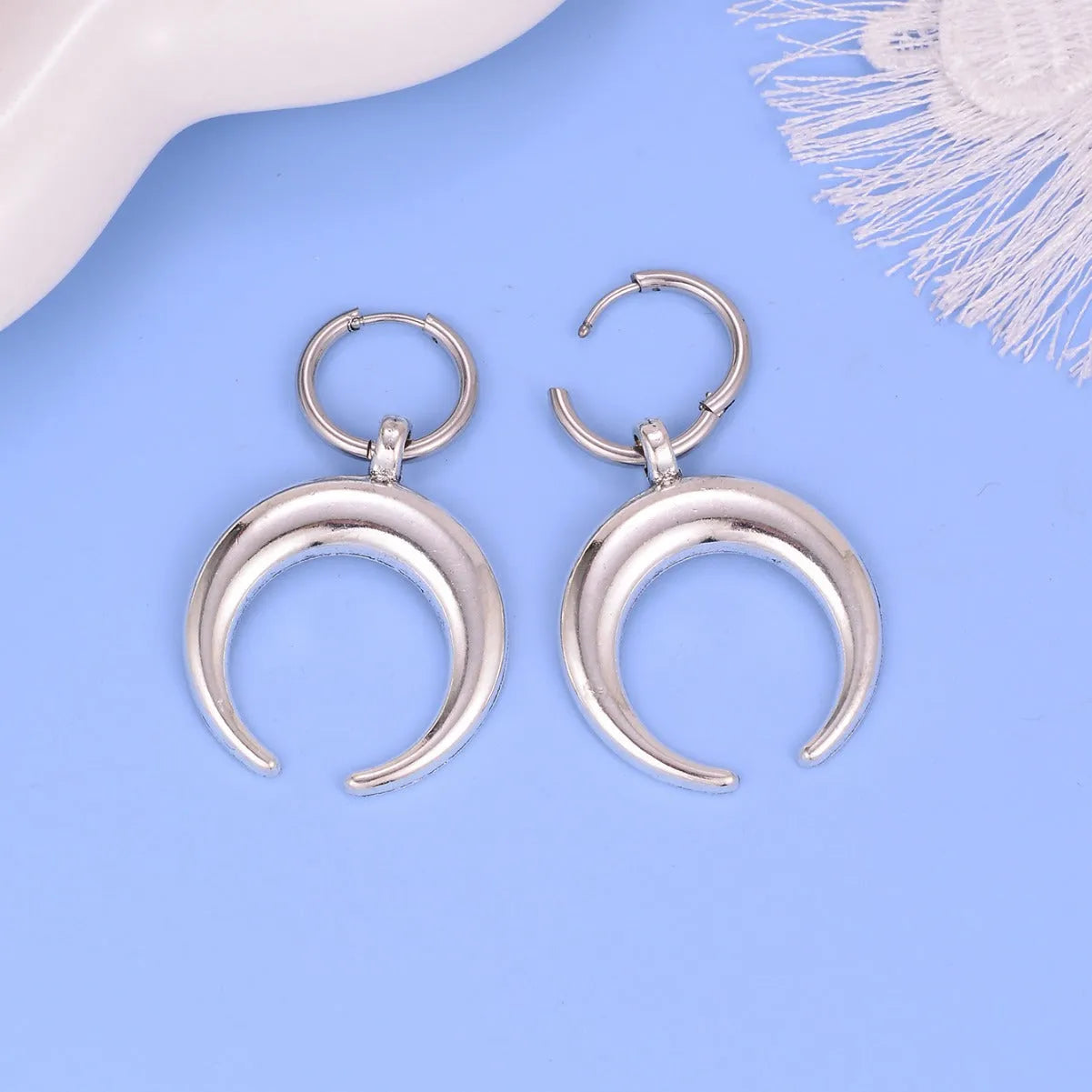 Silver geometric hoop earrings with vintage moon design and punk style