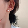 Women's copper earrings with fishtail design in electroplated white gold or yellow gold colour