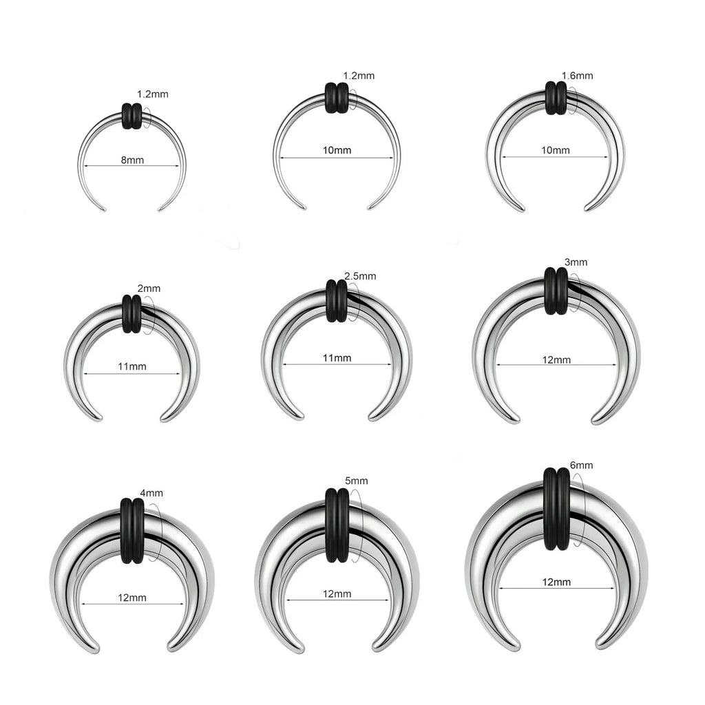 A black and steel coloured C-shaped geometric nose ring made from titanium steel and buffalo horn.