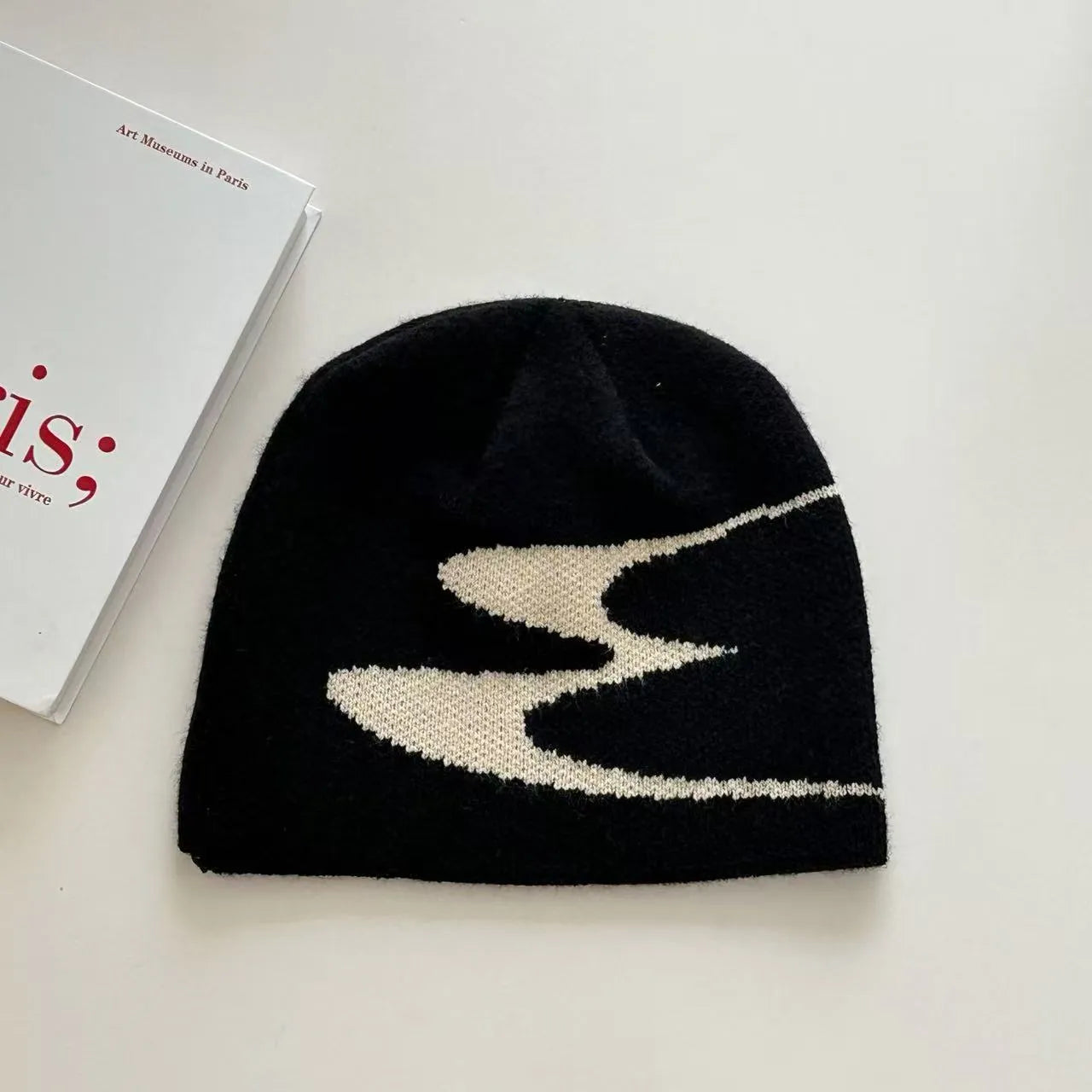 Acrylic knitted beanie hat in black, grey or white colours with 56-58cm head circumference