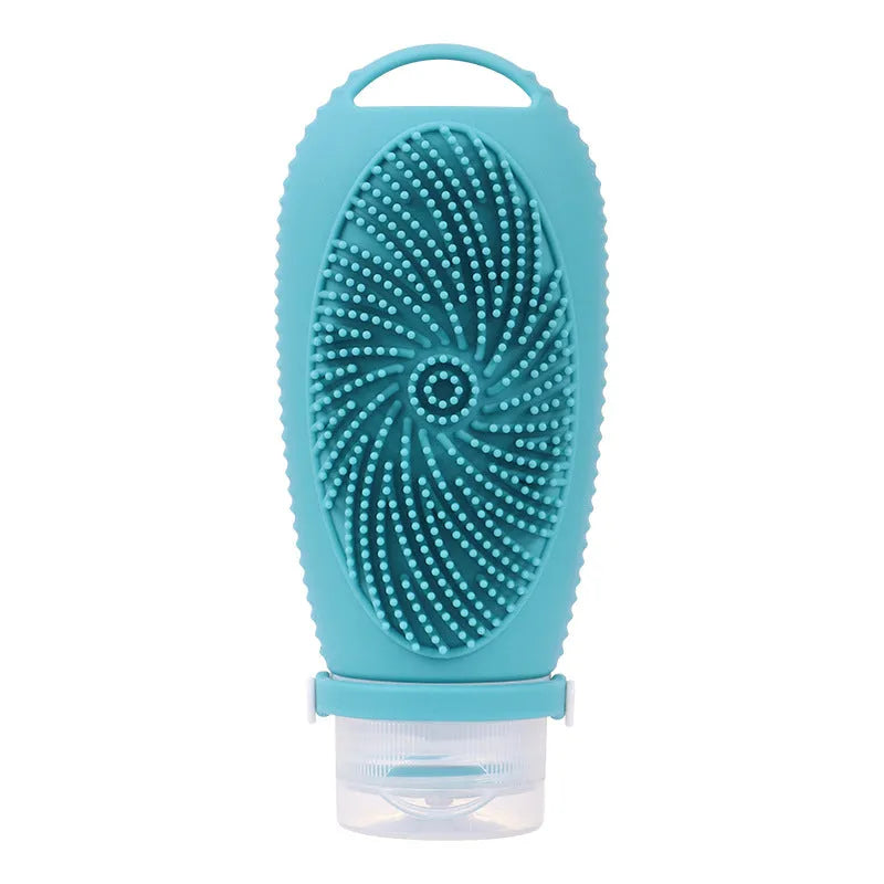 Silicone bath brush storage bottle in eight colour options on a bathroom shelf.