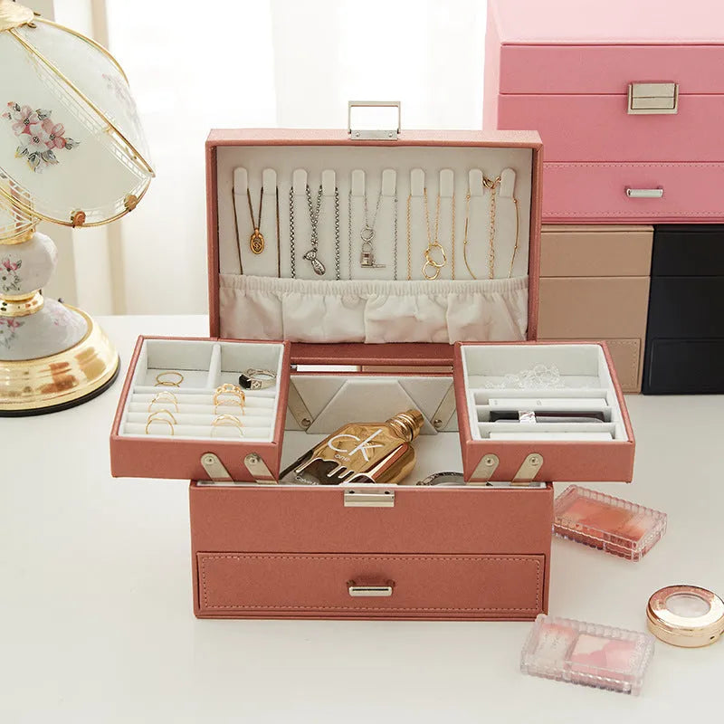 Hard-shell PU leather jewelry storage box in beige, black, pink, or rose gold.