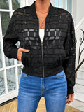 Black women's semi-transparent jacket with geometric pattern and front zipper.