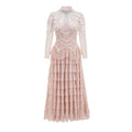 Black long sleeve women's dress with detailed beaded decoration on the bodice.