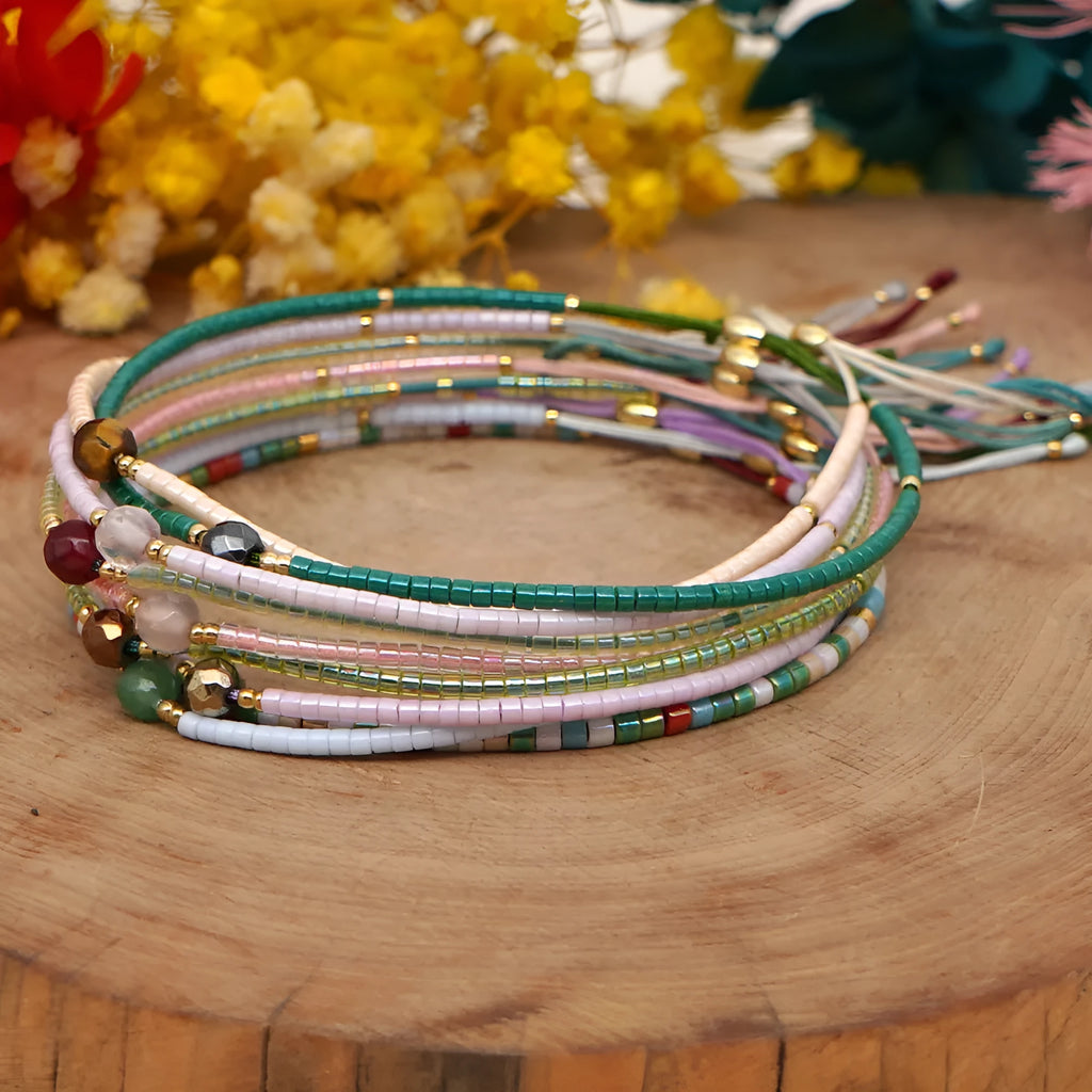 Handmade bohemian style bracelet with colourful geometric glass and coloured glaze beads.