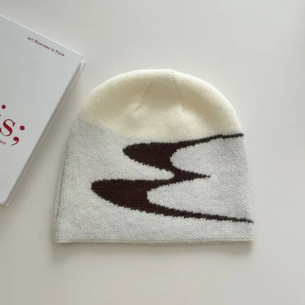 Acrylic knitted beanie hat in black, grey or white colours with 56-58cm head circumference