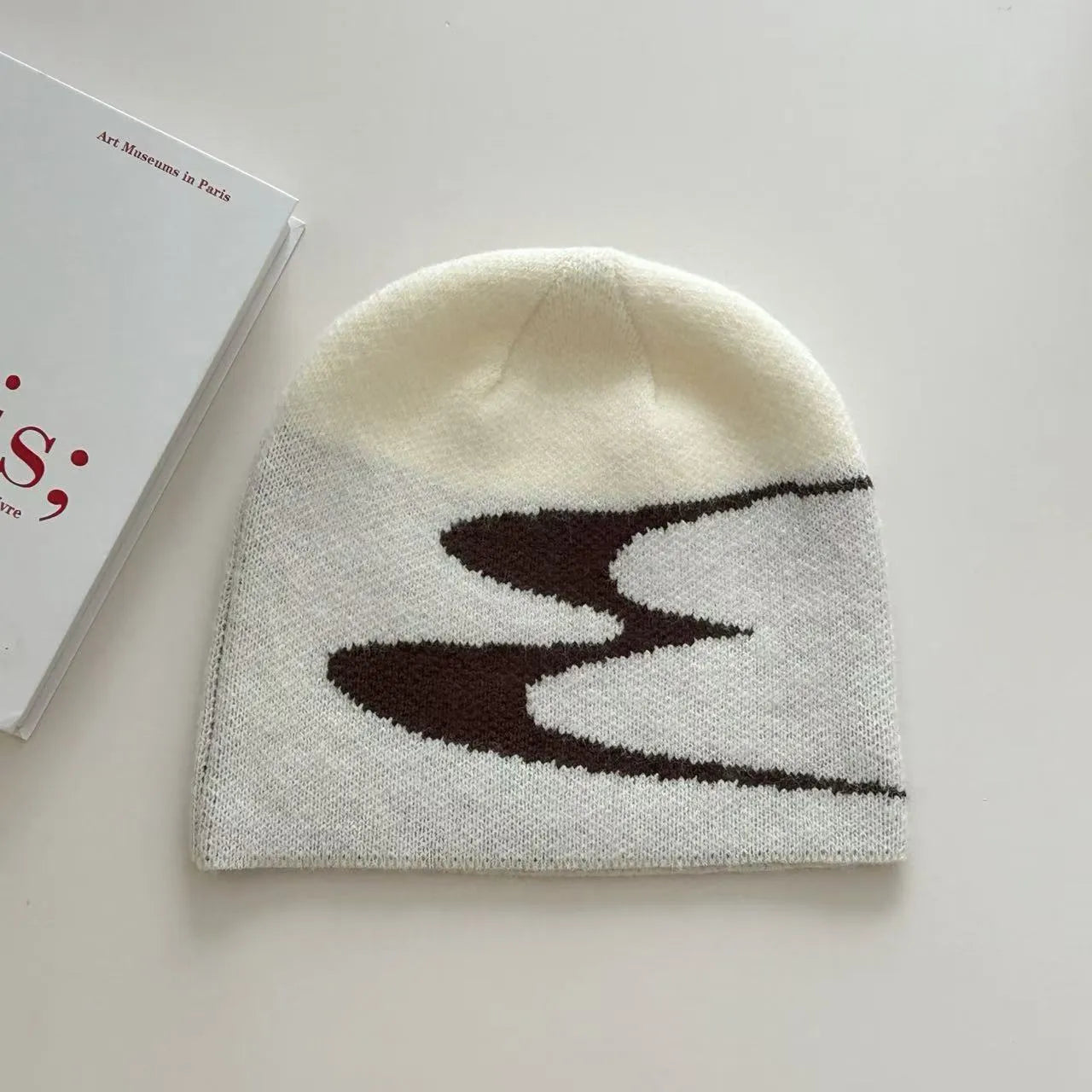 Acrylic knitted beanie hat in black, grey or white colours with 56-58cm head circumference