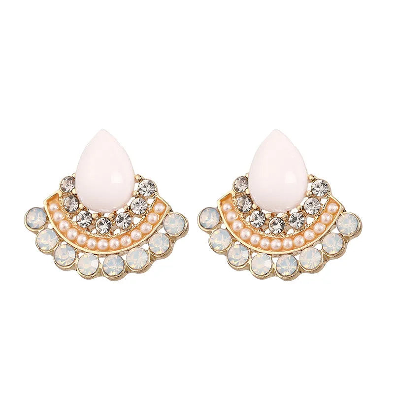 Retro geometric fan-shaped women's earrings with opal and rhinestone details on a silver-coloured background.