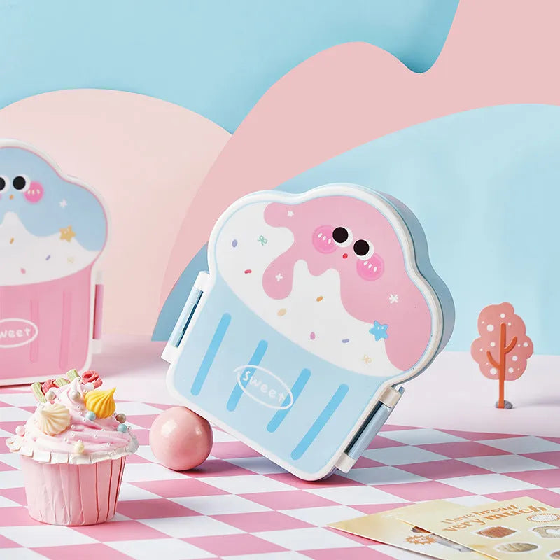 Creative cartoon-style ice cream shaped plastic lunch box with spoon and fork set in pink or blue.