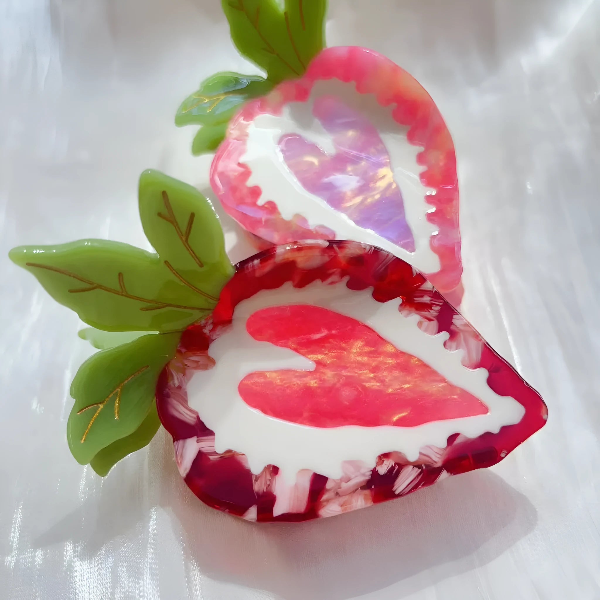 Handmade strawberry design hairpin for girls, shown in red and pink colour options.