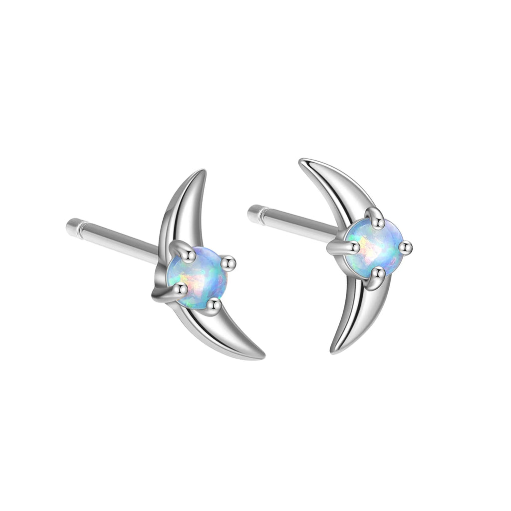 Women's geometric 925 silver earrings with blue stone in gold setting.