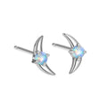 Women's geometric 925 silver earrings with blue stone in gold setting.