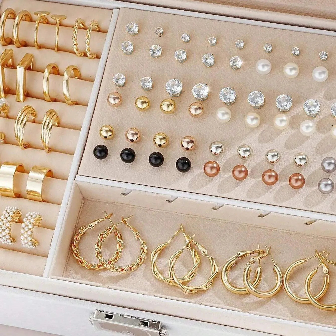 108 geometric pearl earrings assortment showing gold and yellow electroplated colours on alloy construction
