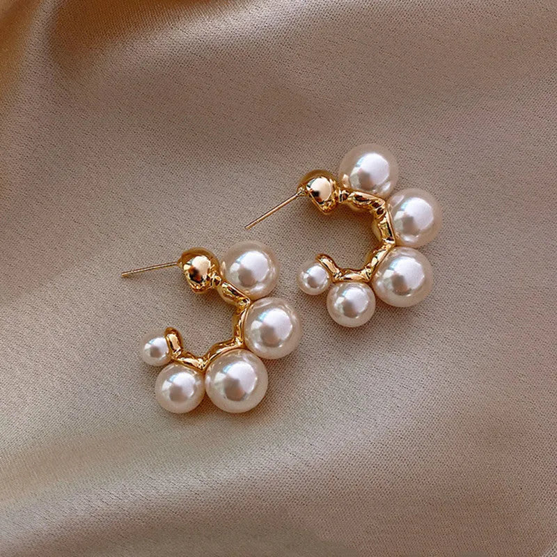 Alloy drop earrings for women with a red bell pendant on a silver-toned chain