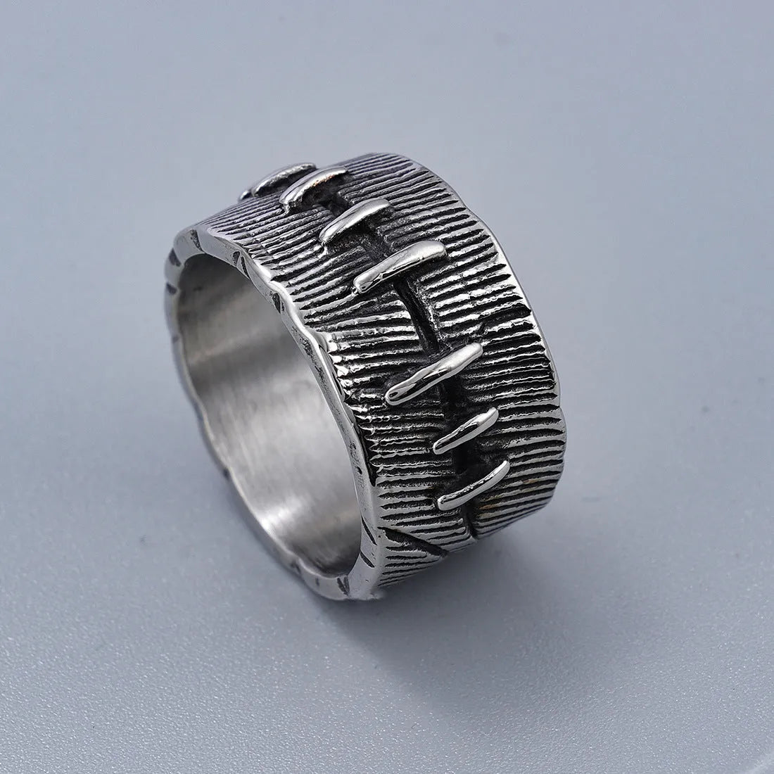 Geometric dark punk titanium steel ring with a double ring design in a retro colour finish.