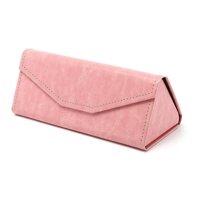 Triangular folding glasses case in various colours showing folded and open positions