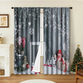 Pair of 3D digital printed Christmas curtains in polyester with European festive patterns hanging at window