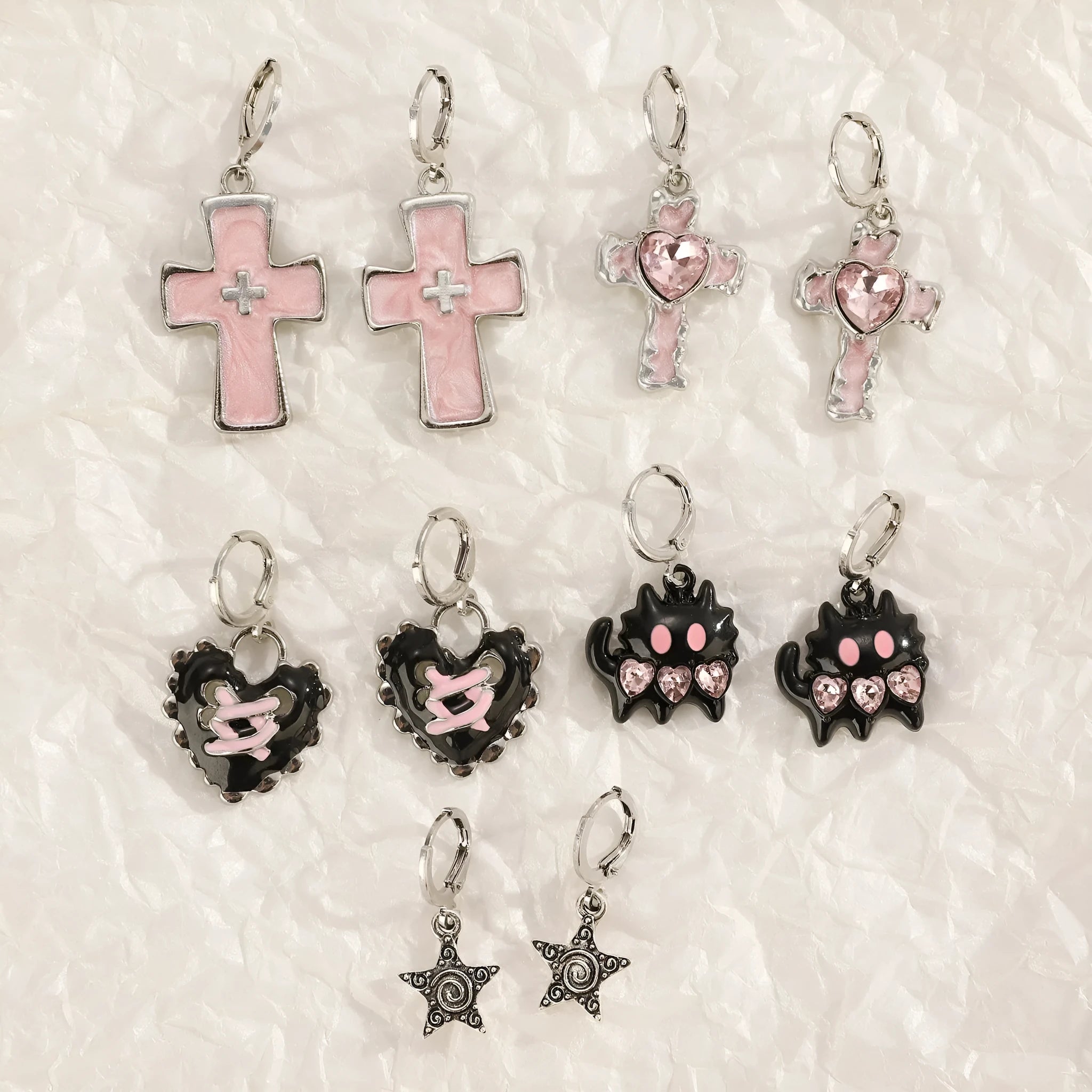 Women's alloy cross crystal earrings in five colour options with cross, heart, and character design elements