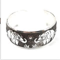 Ethnic style carved open Miao silver bracelet with Roman shape design in alloy