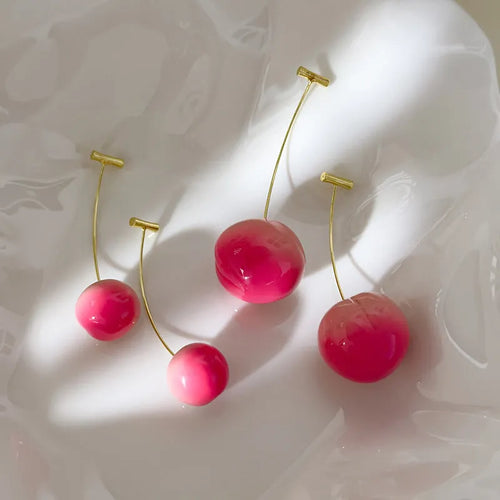 Acrylic juicy peach earrings in small and large sizes with copper hooks