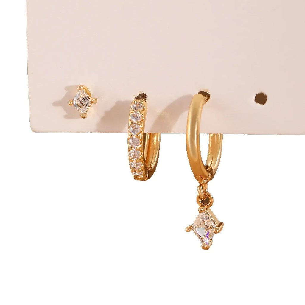 Geometric pattern copper earring set with zircon stones in clip, stud, and dangle styles