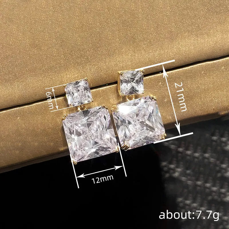 Copper geometric square design earrings with quadrilateral ornament in white gold or golden finish