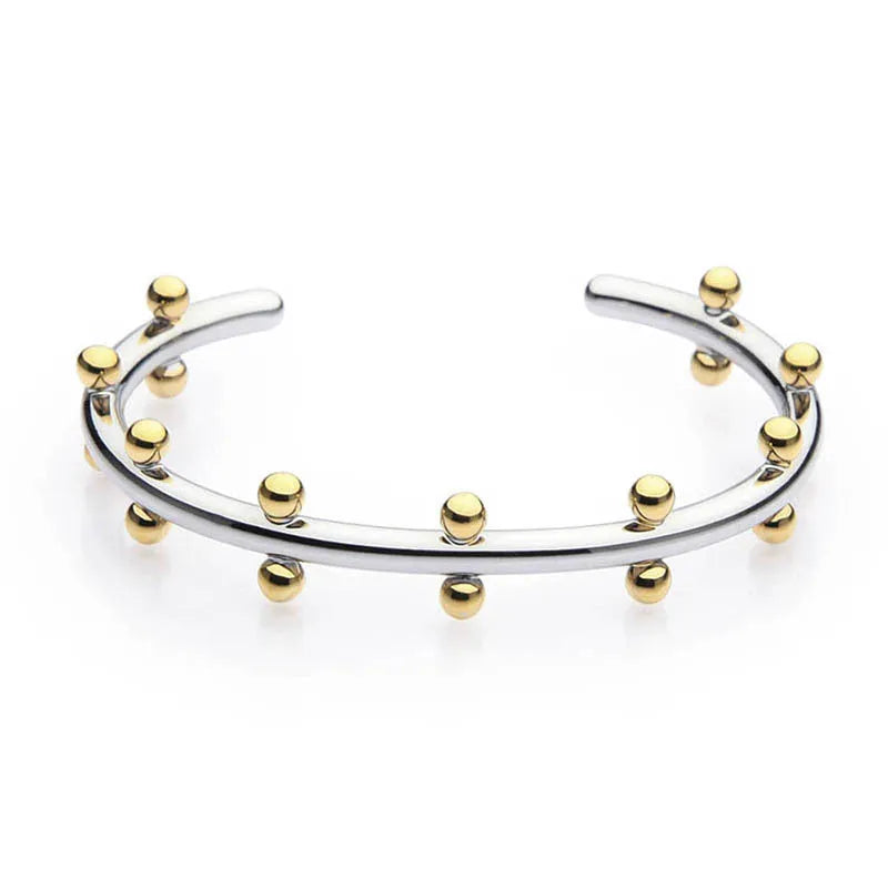 Stainless steel bracelet with textured bean beads and C-shaped adjustable closure