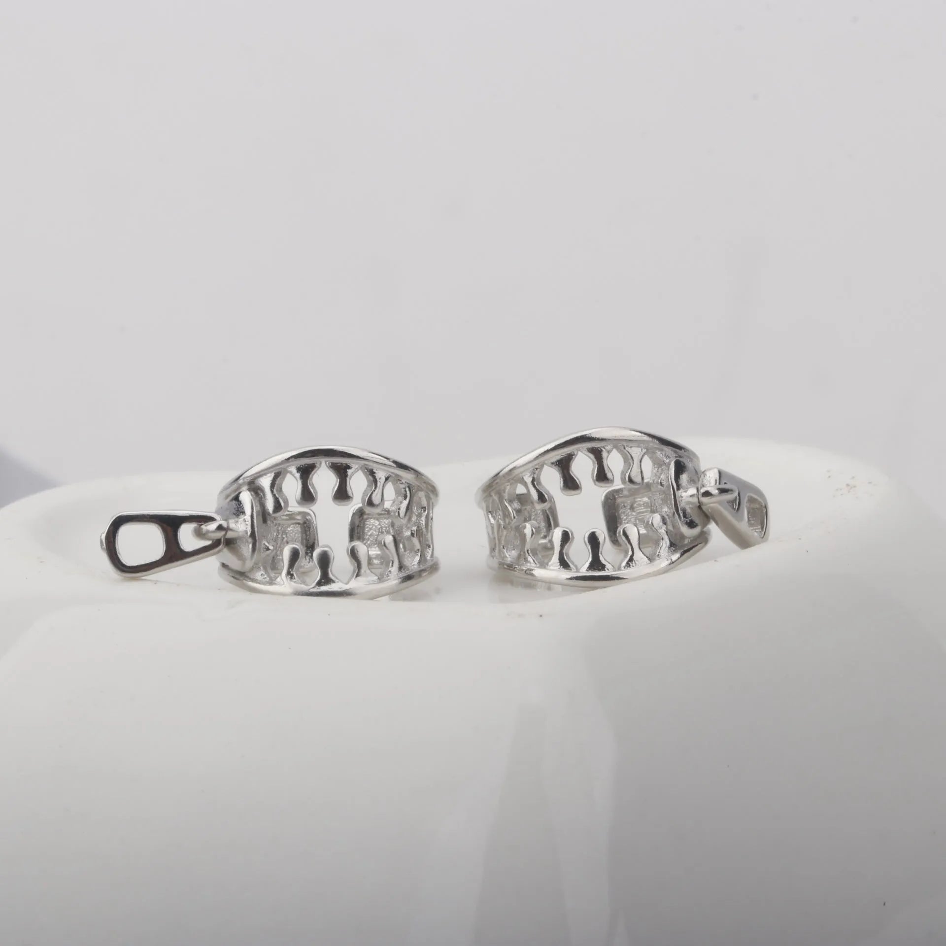 Copper geometric ear bone clip with linear patterns and zipper fastening in ES862 colour
