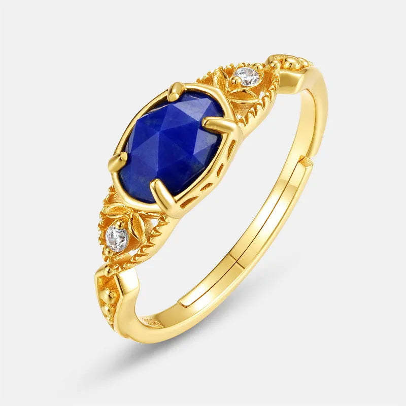 Japanese style silver ring with oval lapis lazuli stone and geometric design