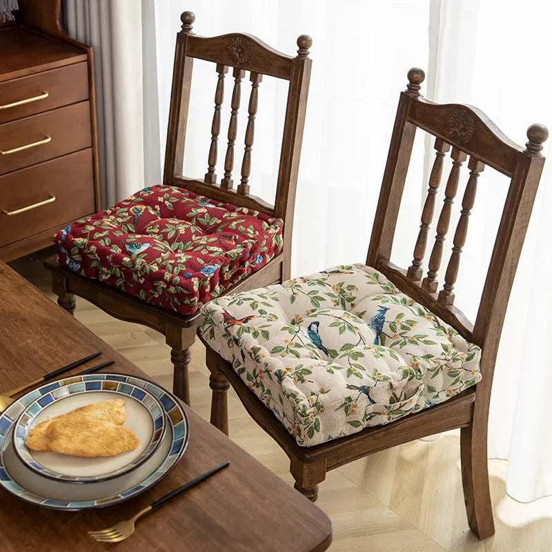 American style dining chair cushion in floral apricot pattern with bird motifs measuring 40x40x8cm