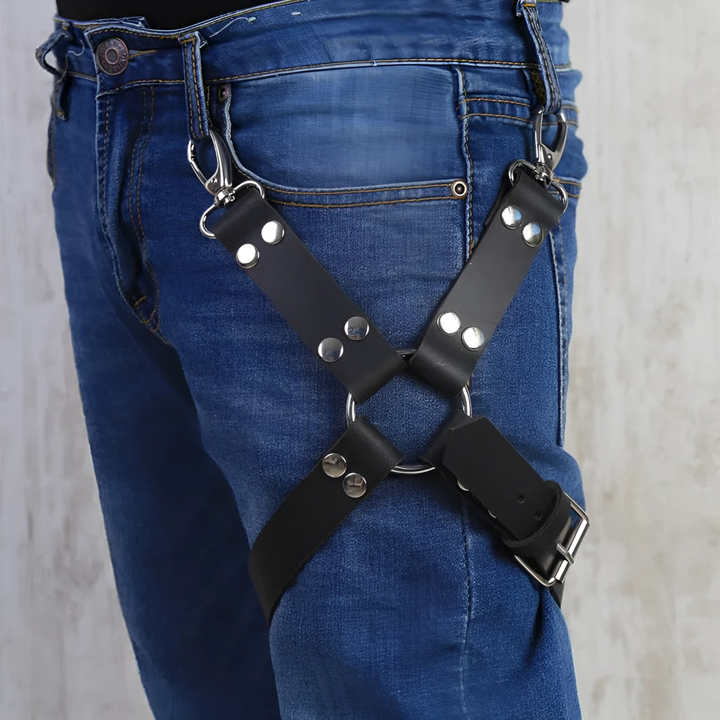 Black PU leather leggings with leather accessories attached to the legs