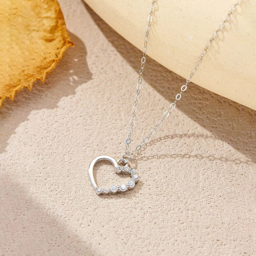 S925 sterling silver hollow heart and circle pendant necklace on a regular chain.