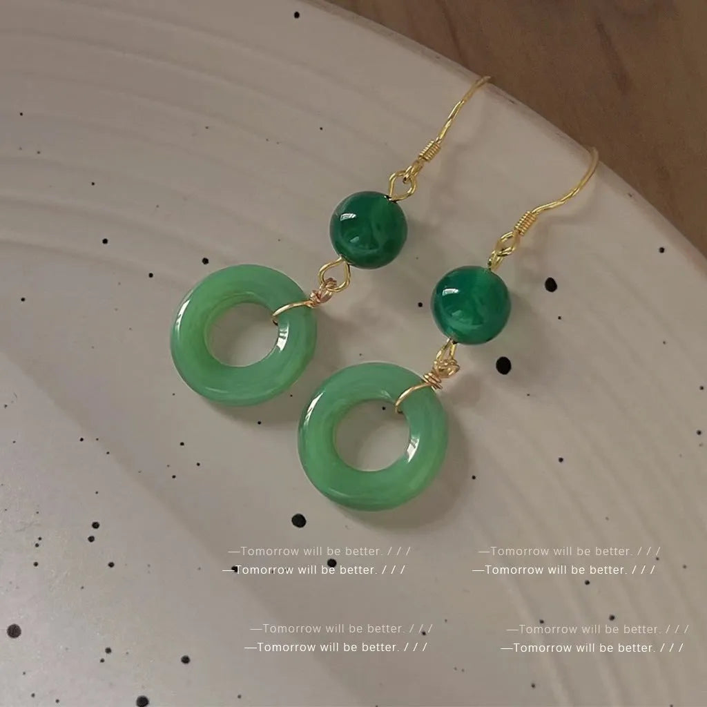 Green geometric peace buckle Chinese-style earrings made from zinc alloy with 14K gold purity plating