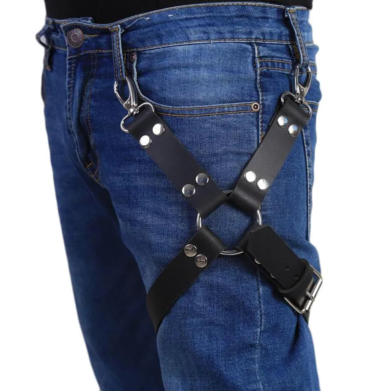 Black PU leather leggings with leather accessories attached to the legs