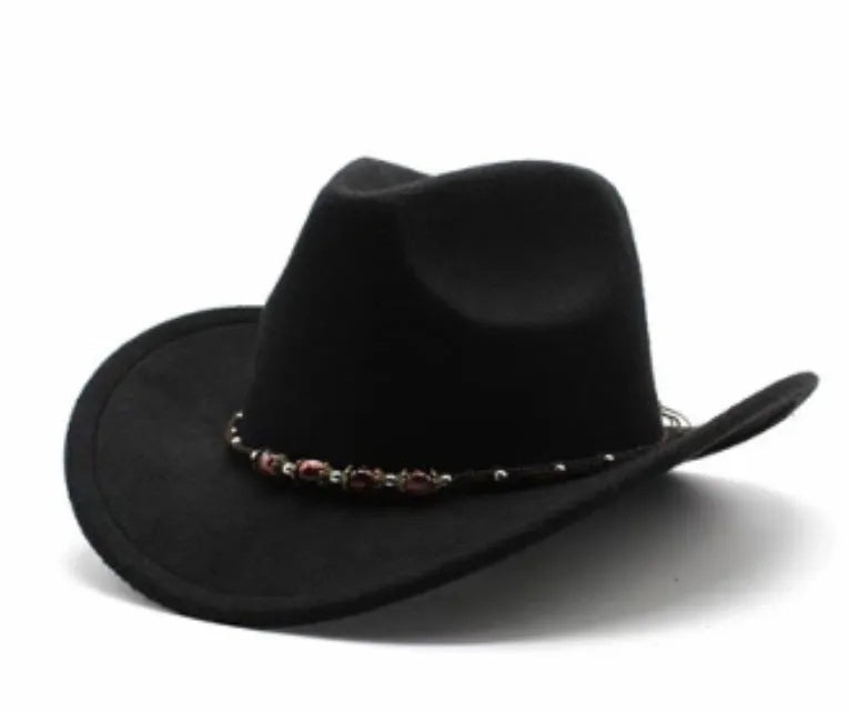 Brown leather velvet Western cowboy hat with a curved edge brim and conical crown.
