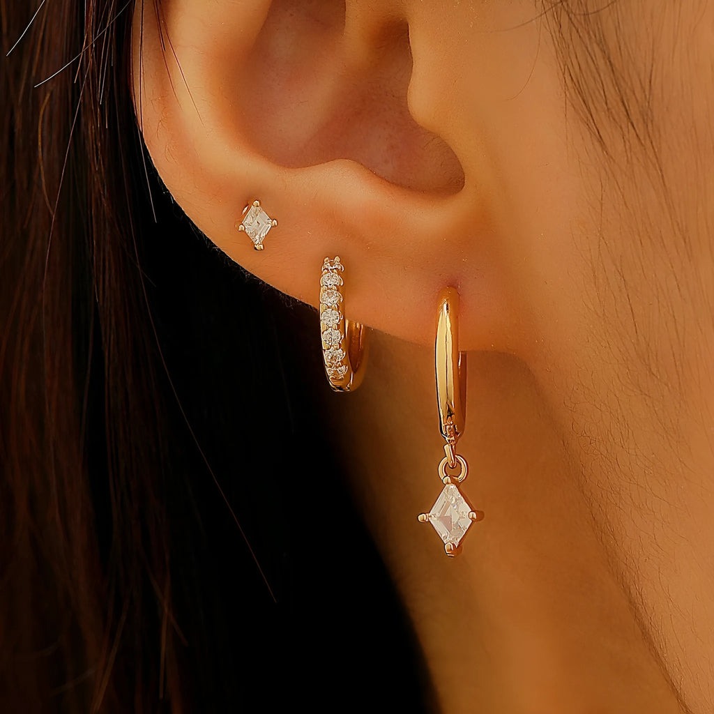Geometric pattern copper earring set with zircon stones in clip, stud, and dangle styles